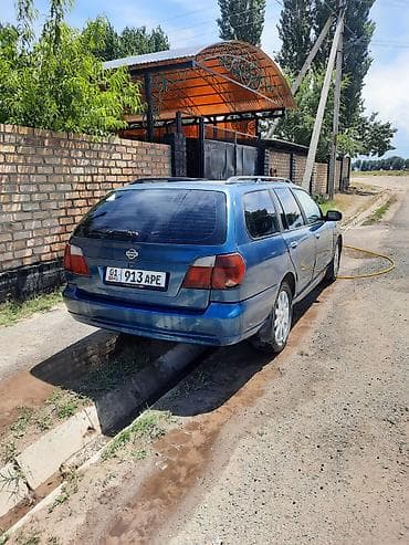 genesis 80: Nissan Primera: 2001 г., Универсал — 4