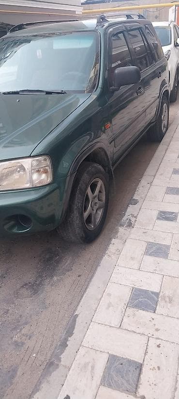 Транспорт: Honda CR‑V I поколения (рестайлинг), тёмно‑зелёный кроссовер. Кузов и — 2
