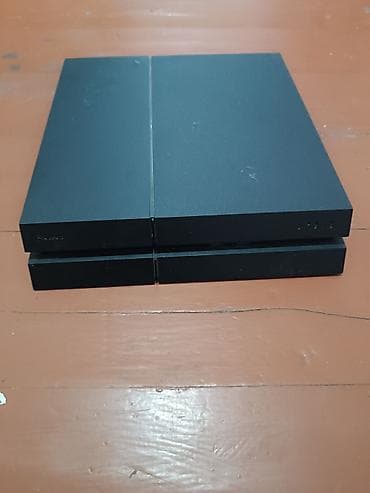 Игровая консоль Sony PlayStation 4 (оригинальная «fat» версия)