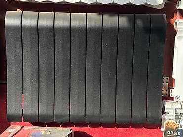 атаплена: Алюминиевый секционный радиатор отопления, окраска матовая черная — 1