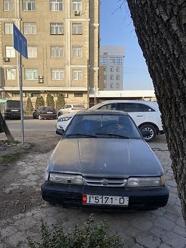 will cypha: Седан среднего класса, левый руль. Кузов 4‑дверный, темно‑серый — 2