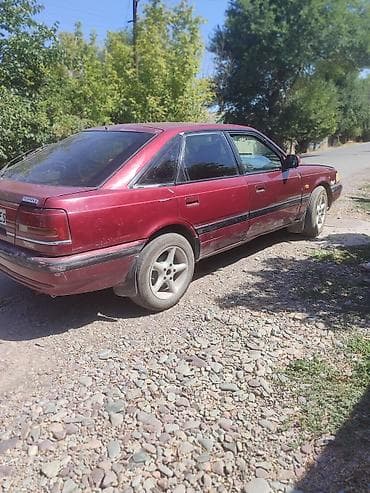 авто аксессуары: Mazda 626: 1991 г., Седан — 4