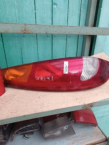 bmw e39: Задний левый стоп-сигнал Ford — 1