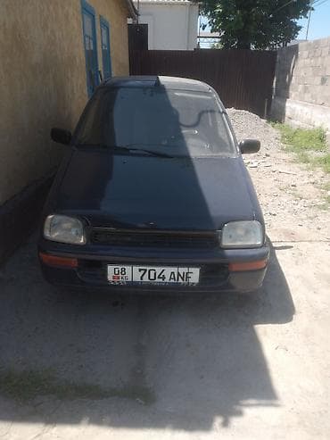 муравей с рулем: Daihatsu Cuore: 1995 г. — 1