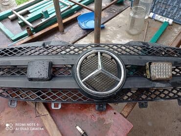 запчасти опель зафира б: Решетка радиатора Мини 2006 г., Оригинал — 1