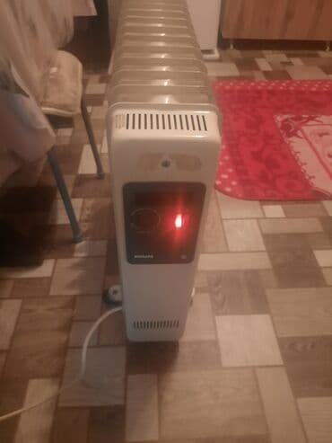 печка дом: Масляный радиатор Philips на колесиках - Тип: электрический масляный — 4
