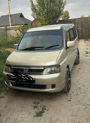 наклейки на машине: Honda Stepwgn: 2003 г., 2 л, Автомат, Газ, Минивэн — 2