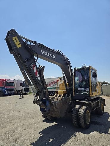 состояние среднее: Экскаватор, Volvo, 2015 г., Колесный — 4