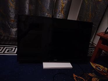 Телевизоры: Телевизор VASIN, диагональ примерно 32–40". Классический черный — 2