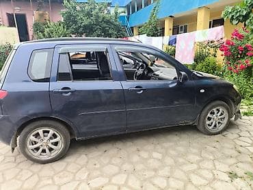 битую машину: Mazda Demio: 2003 г., 1.3 л, Автомат, Бензин, Хэтчбэк — 1