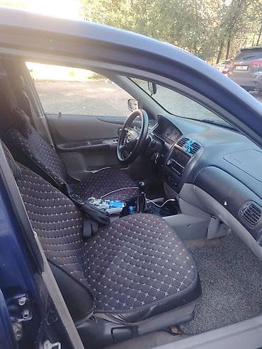 subaru forester 2001: Mazda 323: 2002 г., Механика, Хэтчбэк — 4