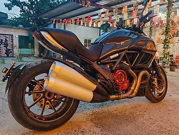 спортивные мотоциклы ducati: Ducati Diavel (чёрный матовый) — мощный крузер/родстер с фирменной — 4