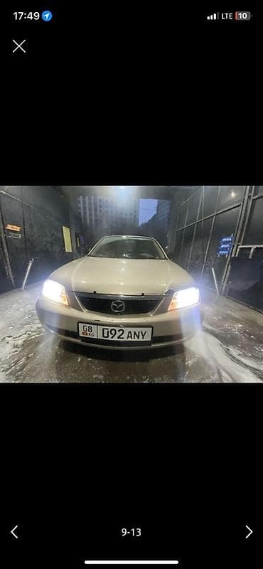 buick gl8: Mazda Capella: 2001 г., 1.5 л, Автомат, Бензин, Седан — 9