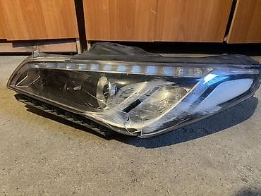 Автокосметика: Передняя левая фара Hyundai Б/у — 1
