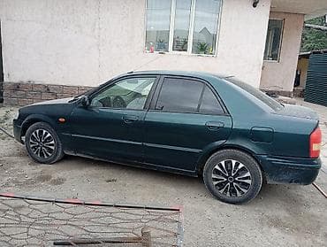 mazda d: Mazda 323: 2001 г., 1.6 л, Механика, Бензин, Седан — 5