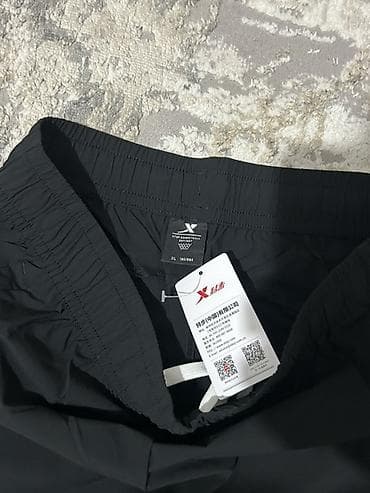 nike tech flece: Черные спортивные брюки Xtep с кнопками по бокам - Модель: Xtep — 4