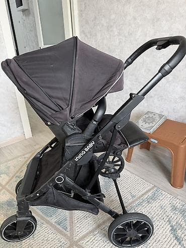 санки со спинкой: Прогулочная коляска Ining Baby (чёрная) - Манёвренная 4‑х колёсная — 1