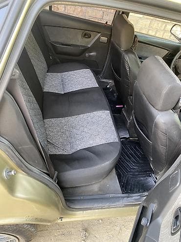 daew: Daewoo Nexia: 2009 г., 1.5 л, Механика, Бензин, Седан — 4