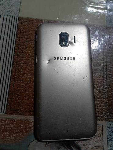 ми 9 с: Samsung Galaxy A02, Б/у, 16 ГБ, цвет - Золотой — 2