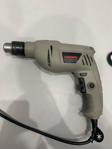 продаю строительные инструменты: Ударная дрель Crown CT10065 мощностью 600 Вт с регулируемой скоростью — 6
