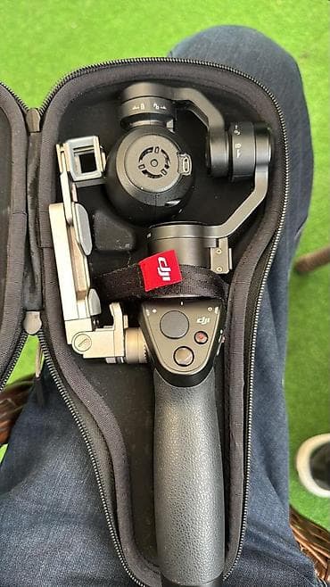 скупка видеокамер: Карманная стабилизированная камера DJI Osmo с 3-осевым подвесом — 1