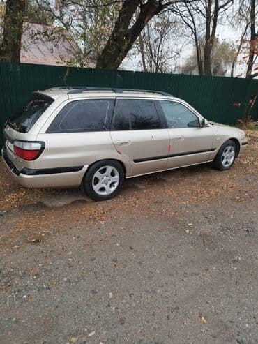 срочно продаю в связи с переездом: Mazda 626: 1998 г., 2 л, Бензин, Универсал — 18