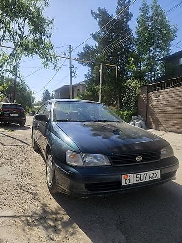 Toyota Carina E: 1993 г., 2 л, Механика, Бензин, Седан