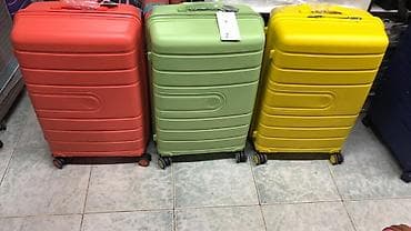 Жёсткие чемоданы на колёсах — яркие цвета (коралловый, фисташковый