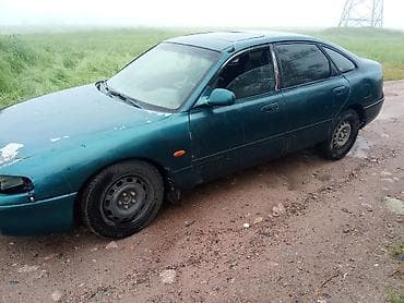 капот солярис: Mazda 626: 1992 г., Седан — 3