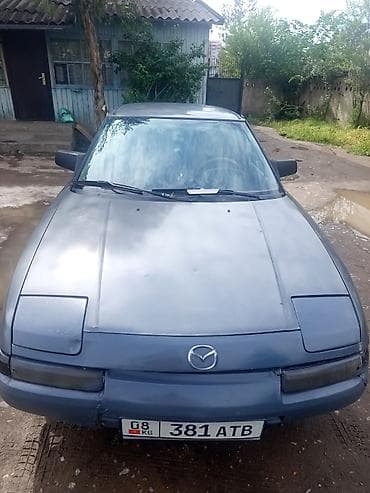 Mazda 323: 1989 г., Кол менен иштөөчү, Седан — 5