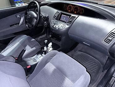 s 140: Nissan Primera: 2004 г. — 6