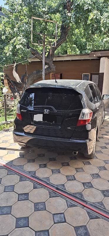 Honda Fit: 2009 г., 1.5 л, Автомат — 2