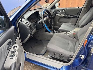 глушитель спортивный: Mazda 323: 2000 г., Хэтчбэк — 9