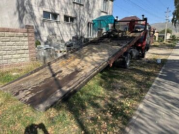 тягач двух мостовой: С гидроманипулятором — 6