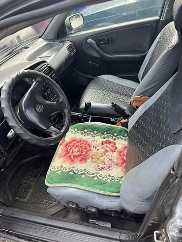 тез арада: Nissan Primera: 1991 г., 1.6 л, Кол менен иштөөчү, Бензин, Седан — 6