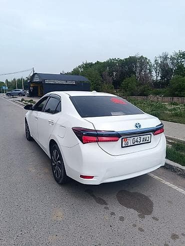 corolla: Toyota Corolla: 2019 г., 1.8 л, Гибрид, Седан — 2