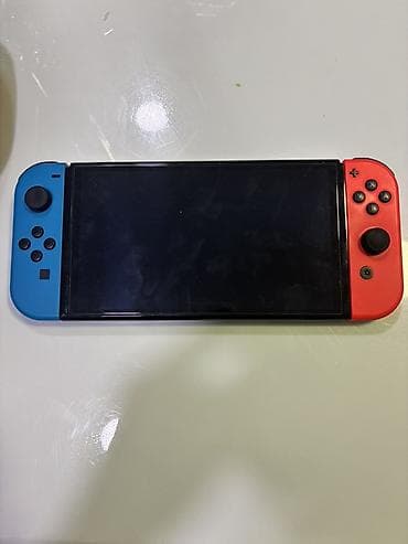 samsung 02: Nintendo Switch (OLED), неоново‑красно/синие Joy‑Con. Комплектация: - — 3