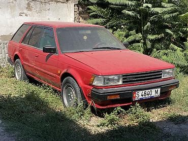 g comp: Nissan Bluebird: 1986 г., 1.8 л, Механика, Бензин, Универсал — 1