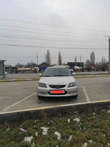 Ламинат: Mazda 323: 2002 г., 1.5 л, Автомат, Бензин, Универсал — 2