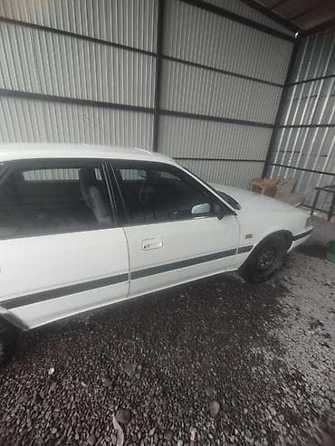 обшивка борт: Продаётся легковой автомобиль белого цвета, 4‑дверный седан/хэтчбек — 7