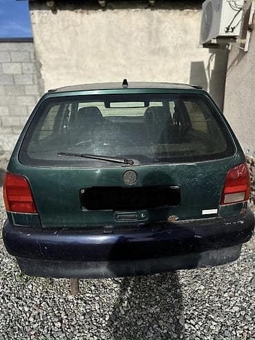 колпачки: Volkswagen Polo: 1993 г., Хэтчбэк — 3