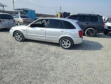 Mazda 323: 2002 г., 1.6 л, Автомат, Газ — 1
