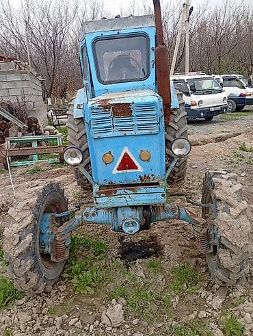 трактор т70: Трактор колесный, с кабиной, голубого цвета. Характеристики и — 3