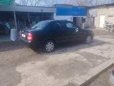 4 5мм: Mazda 323: 2001 г., 1.6 л, Автомат, Бензин, Седан — 5