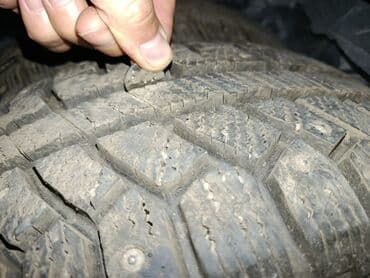 зимние баллоны: Шипованная зимняя автомобильная шина. 2023 год выпуска - Протектор с — 2