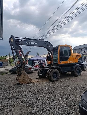 Экскаватор, Volvo, 2010 г., Колесный