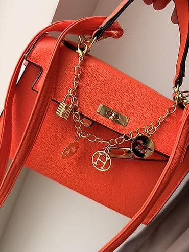 сумку клатч ysl: Яркая женская сумка под Hermes Kelly в оранжевом цвете. - — 2