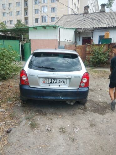 пружины нива: Mazda 323: 2003 г., 2 л, Механика, Дизель, Хэтчбэк — 2