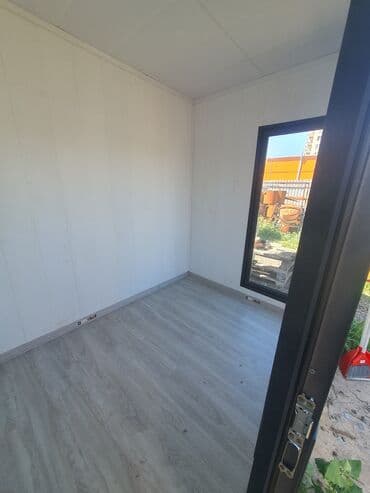 селекция дом куплю: Небольшой павильон прямоугольной формы с отделкой под дерево и серыми — 5