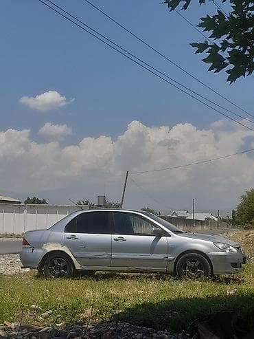 Транспорт: Mitsubishi Lancer: 2005 г., 1.6 л, Механика, Бензин, Седан — 2